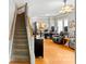 Open living area with hardwood floors, and staircase to the second level at 3007 Colonel Springs Way, Fort Mill, SC 29708