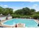 Community swimming pool with lounge chairs and pergola at 3007 Colonel Springs Way, Fort Mill, SC 29708