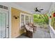 Outdoor porch with rocking chairs and views of the trees at 3007 Colonel Springs Way, Fort Mill, SC 29708