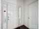 Bright entryway featuring a white paneled front door with glass accents at 3014 Robin Terry Ct, Charlotte, NC 28208