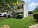 Charming two-story home featuring manicured lawn, vinyl siding, and traditional window shutters at 3014 Robin Terry Ct, Charlotte, NC 28208