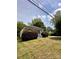 Quaint single-story home featuring an inviting porch and mature landscaping for enhanced curb appeal at 306 Sacco St, Belmont, NC 28012