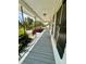 Inviting porch with classic railings providing shade and a comfortable outdoor space at 306 Sacco St, Belmont, NC 28012