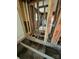 Basement view with visible joists and beams, showcasing the structural details and renovation potential at 324 S Spruce St, Rock Hill, SC 29730
