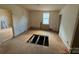 Bedroom needing renovation with light from a single window and hardwood floors at 324 S Spruce St, Rock Hill, SC 29730
