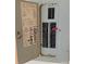 Close-up of the home's electrical panel, revealing circuit breakers and detailed electrical specifications at 324 S Spruce St, Rock Hill, SC 29730
