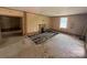 View of living room needing renovation, fireplace, and natural light at 324 S Spruce St, Rock Hill, SC 29730