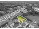 An aerial view showcases the property's location, lot lines, and proximity to a nearby wooded area and neighborhood streets at 3537 Heather Ln, Gastonia, NC 28056