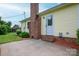 Exterior view of a house with siding, brick details, and a carport at 3537 Heather Ln, Gastonia, NC 28056