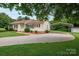 Inviting exterior of a well-maintained home with a convenient carport, great for covered parking at 3537 Heather Ln, Gastonia, NC 28056