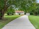 A charming single-story home is featured, with a covered carport, and well-maintained landscaping alongside a concrete driveway at 3537 Heather Ln, Gastonia, NC 28056