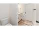 Well-appointed bathroom featuring a modern vanity, toilet, and stylish fixtures, providing a comfortable space at 406 N Bostian St, China Grove, NC 28023