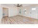 Bright, airy living room with luxury vinyl floors, neutral walls, modern ceiling fan, and lots of natural light at 406 N Bostian St, China Grove, NC 28023
