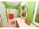 Well-lit bathroom features a shower-tub combo, and large mirror at 4646 River Run Cir, Hickory, NC 28602