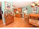Open floor plan with eat-in kitchen featuring wooden cabinets and view to dining area at 4646 River Run Cir, Hickory, NC 28602
