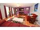 Cozy living room features hardwood floors, decorative rug, ceiling fan, and modern furnishings at 4646 River Run Cir, Hickory, NC 28602