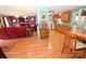 Open concept living area with updated eat-in kitchen and living room with hardwood floors at 4646 River Run Cir, Hickory, NC 28602