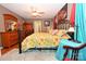 Spacious main bedroom features a ceiling fan, ensuite bathroom, and large closet at 4646 River Run Cir, Hickory, NC 28602