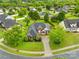 Scenic aerial view of a home nestled in a lush, green neighborhood at 4809 Mossy Cup Ln, Monroe, NC 28110