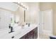 Bathroom with double sink vanity, white countertops, and lots of natural light at 4809 Mossy Cup Ln, Monroe, NC 28110
