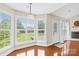 Cozy breakfast nook with lots of natural light, hardwood floors and view of back yard at 4809 Mossy Cup Ln, Monroe, NC 28110
