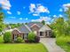 Charming single-story brick home with well-manicured lawn and inviting curb appeal at 4809 Mossy Cup Ln, Monroe, NC 28110