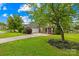 Lovely home with mature trees, and a long driveway at 4809 Mossy Cup Ln, Monroe, NC 28110