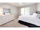 Bedroom featuring neutral walls, carpet, a window, ceiling fan, and matching dresser at 4925 Cedar Forest Dr, Charlotte, NC 28226