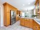 Spacious kitchen boasts ample storage, stainless steel appliances, and a breakfast bar for convenient meals at 4925 Cedar Forest Dr, Charlotte, NC 28226