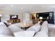 A spacious living room featuring neutral tones and lots of natural light at 4925 Cedar Forest Dr, Charlotte, NC 28226