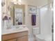 Bathroom featuring single vanity, toilet and walk-in shower at 499 Granite Lake Ct, Denver, NC 28037