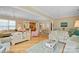 Spacious living area with hardwood floors, comfortable seating, and natural light at 499 Granite Lake Ct, Denver, NC 28037