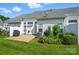 Charming backyard featuring a patio area, lush greenery, and a well-maintained exterior at 513 Pate Dr, Fort Mill, SC 29715