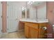 Well-lit bathroom with a light pink paint, vanity, and well-lit mirror above the sink at 513 Pate Dr, Fort Mill, SC 29715