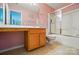 Bathroom with a wooden vanity, large mirror, toilet, and shower-tub combo with sliding doors at 513 Pate Dr, Fort Mill, SC 29715