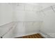 Walk-in closet featuring ample shelving space for organized storage at 513 Pate Dr, Fort Mill, SC 29715