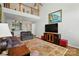 Spacious living room featuring hardwood floors, high ceilings, and comfortable seating arrangements at 513 Pate Dr, Fort Mill, SC 29715