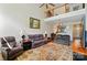 Spacious living room with high ceilings, a ceiling fan, and a view of the upper level at 513 Pate Dr, Fort Mill, SC 29715