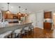 Stylish kitchen with granite countertops, breakfast bar seating, and modern appliances at 516 Amanda Dr, Weddington, NC 28104