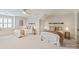 Spacious bedroom with two beds, soft carpeting, and bright natural light at 5917 Bridger Ct, Charlotte, NC 28211