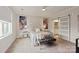Comfortable bedroom with stylish decor, ceiling fan and a sliding barn door to the en suite bathroom at 602 Compass Dr, Denver, NC 28037