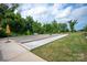 An outdoor bocce ball court with manicured landscaping to enhance the appeal of the community at 602 Compass Dr, Denver, NC 28037