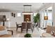 Elegant dining room featuring a rectangular chandelier and a large window at 602 Compass Dr, Denver, NC 28037