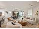 Stylish living room with comfortable seating, a dining table, and sliding glass doors to the outdoors at 602 Compass Dr, Denver, NC 28037