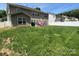 Spacious backyard perfect for outdoor activities, featuring lawn and fence at 6120 Brightstar Valley Rd, Mint Hill, NC 28227