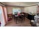 Cozy dining room featuring a wooden table, neutral walls, and ample natural light at 6120 Brightstar Valley Rd, Mint Hill, NC 28227