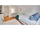 Cozy bedroom featuring a single bed, wooden floors, and a beanbag chair for relaxation at 6626 Rocky Falls Rd, Charlotte, NC 28211