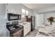 Charming kitchen featuring modern appliances and stylish backsplash, perfect for cooking and entertaining at 6626 Rocky Falls Rd, Charlotte, NC 28211