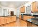 Spacious kitchen with granite countertops and stainless steel appliances at 7043 Blakeney Greens Blvd, Charlotte, NC 28277