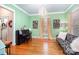 Stylish living room features unique decor, ample space, and great natural light at 7043 Blakeney Greens Blvd, Charlotte, NC 28277